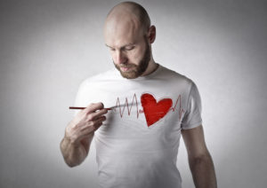 man painting shirt heart and health