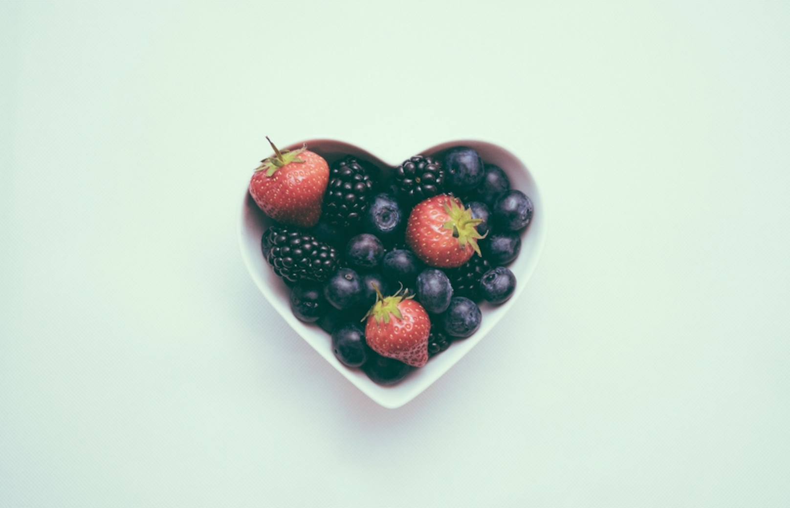 heart shaped bowl of fruit -Heart Attack Prevention