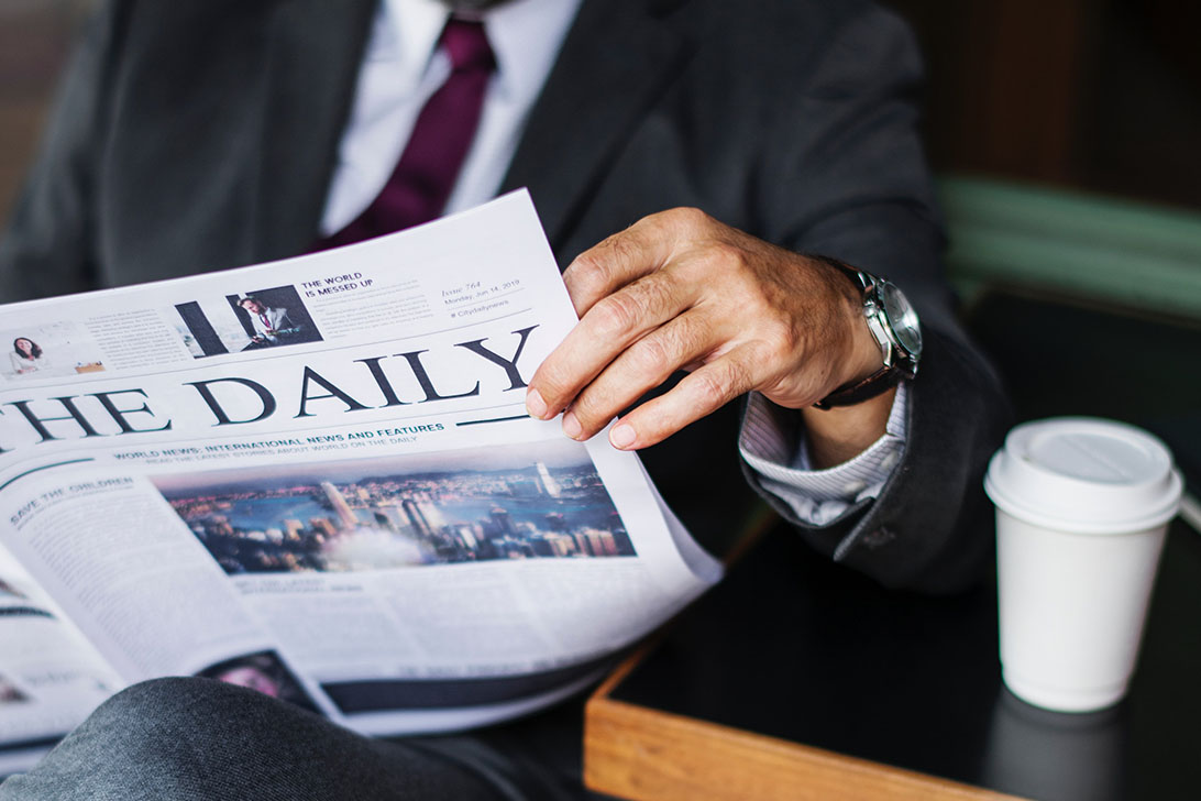 Morning Ritual, Man drinking coffee, reading newspaper.